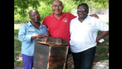 From left, veteran bee-keepers Janice Fraser, Toshao of Mainstay/Whyaka Village Joel Fredericks, and Carlotta De Jesus, with the newly acquired revolutionary Perone hive